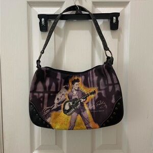 Artistic Black and Purple Shoulder Bag with Graphic Design
